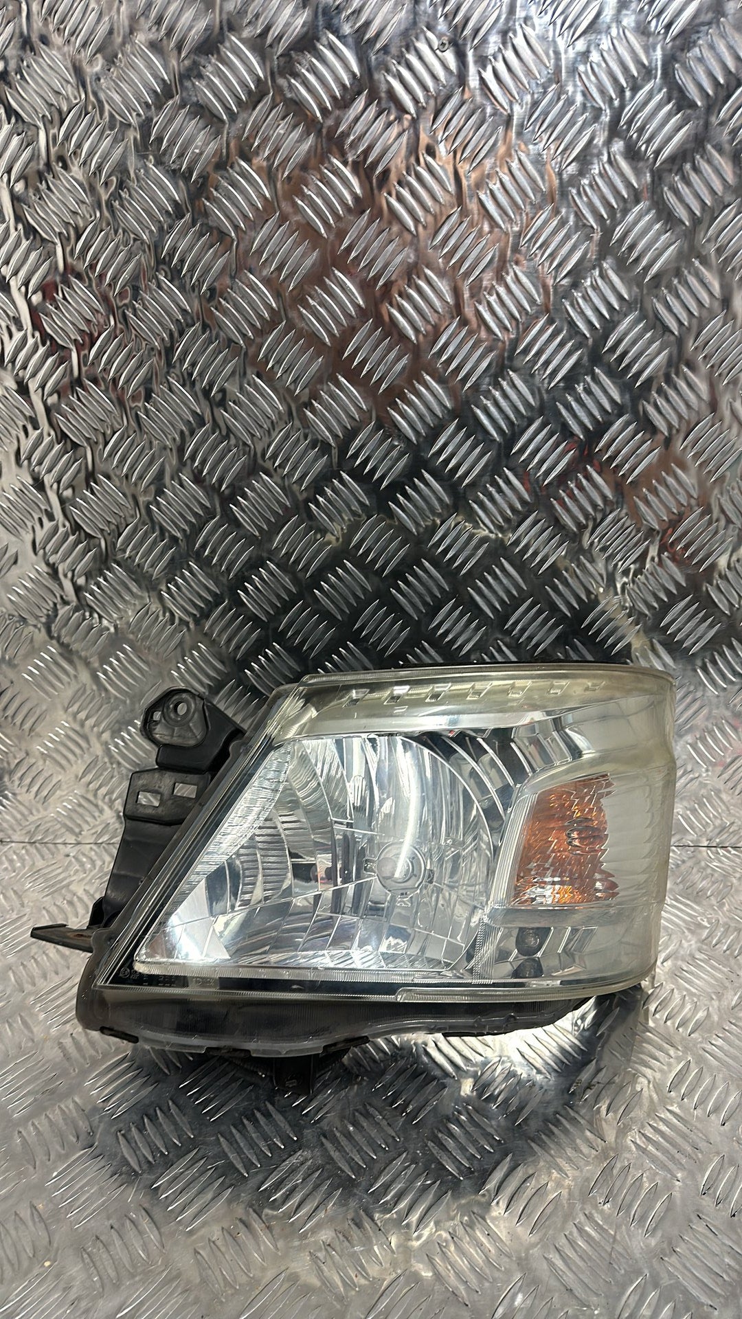 Nissan NV350- Left Headlight PN: ICHIKOH VALEO 1021