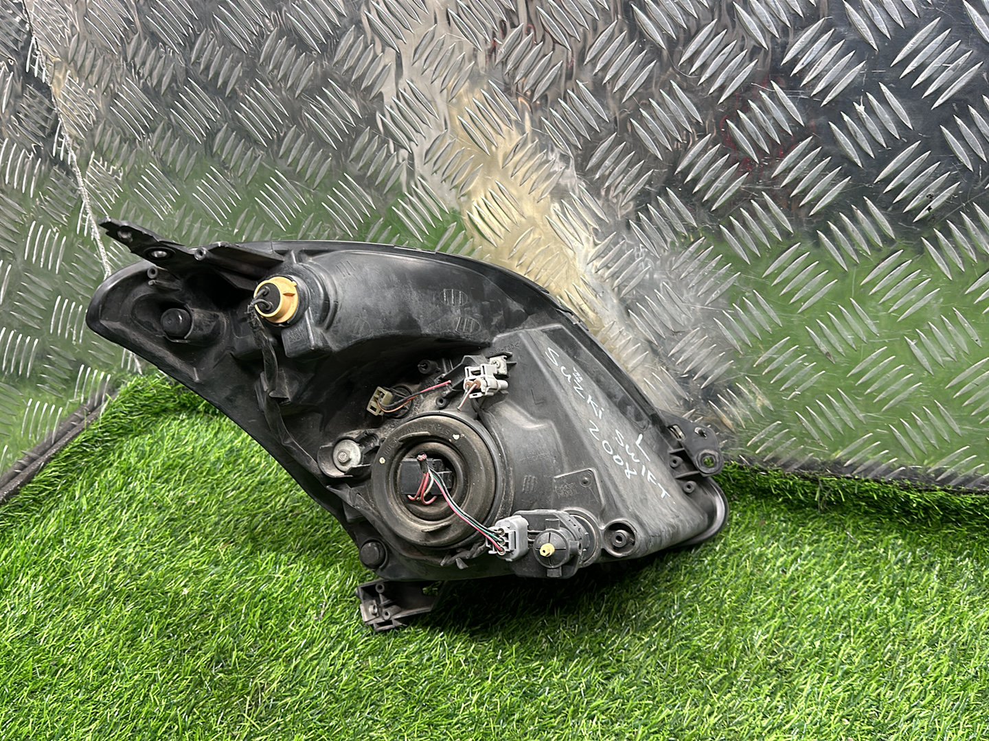 2004 - 2010 Suzuki Swift Left Headlight STANLEY P4432L