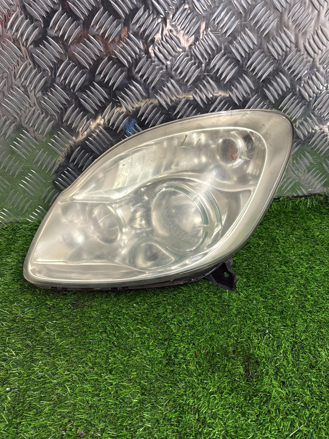 2004 - 2015 Mazda Verisa Left Headlight STANLEY P4515