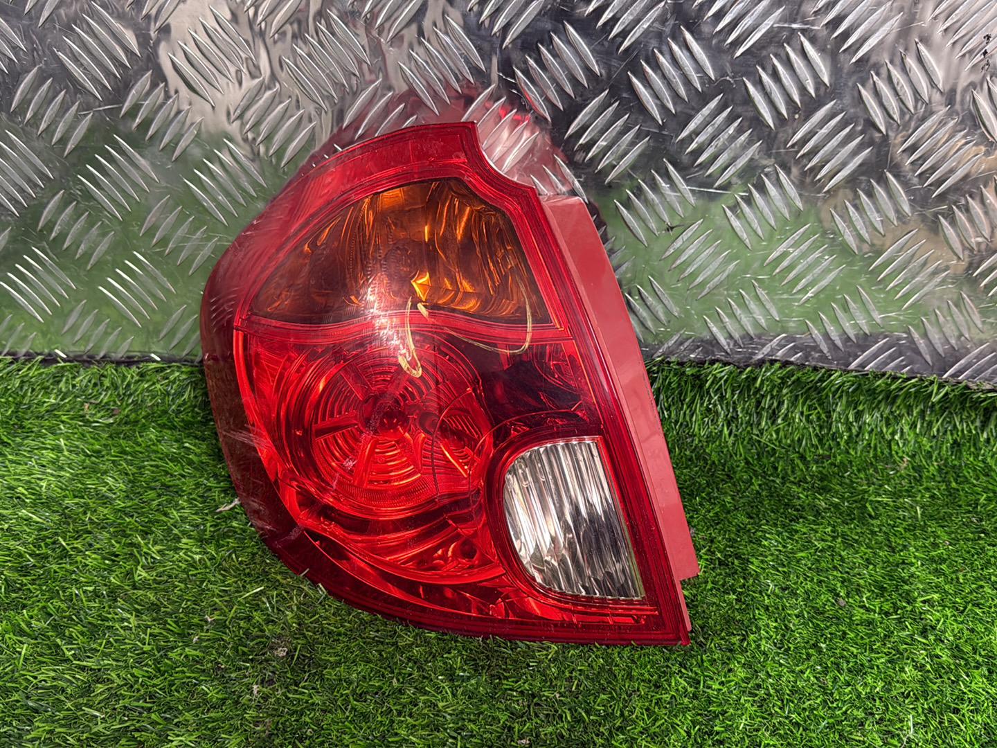 2004 - 2015 Mazda Verisa Left Taillight STANLEY P4417