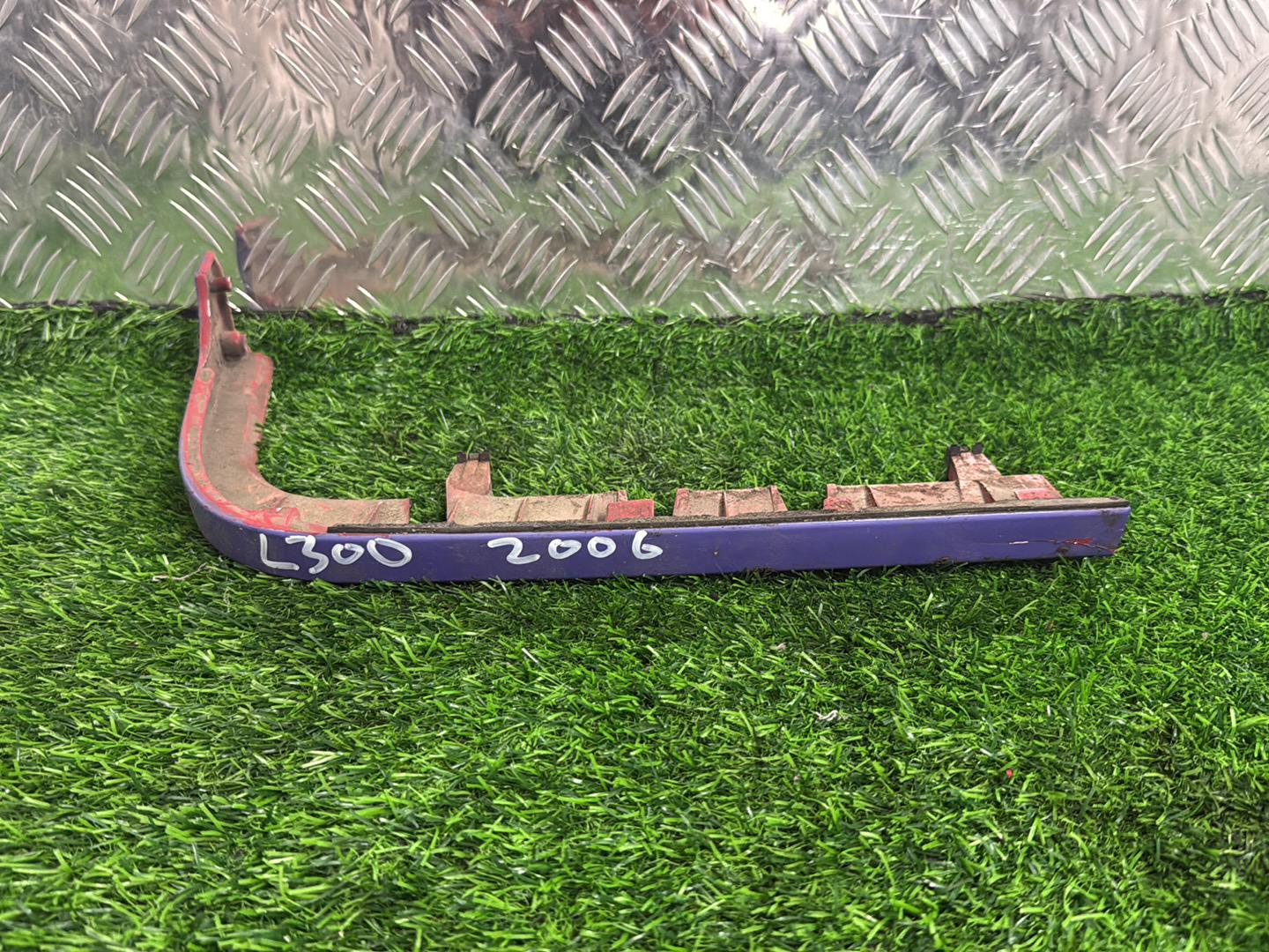 1990 - 2012 Mitsubishi L300 Right Headlight Bracket 120-37615