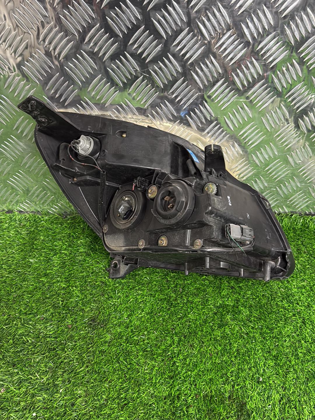 2004 - 2015 Mazda Verisa Left Headlight STANLEY P4515