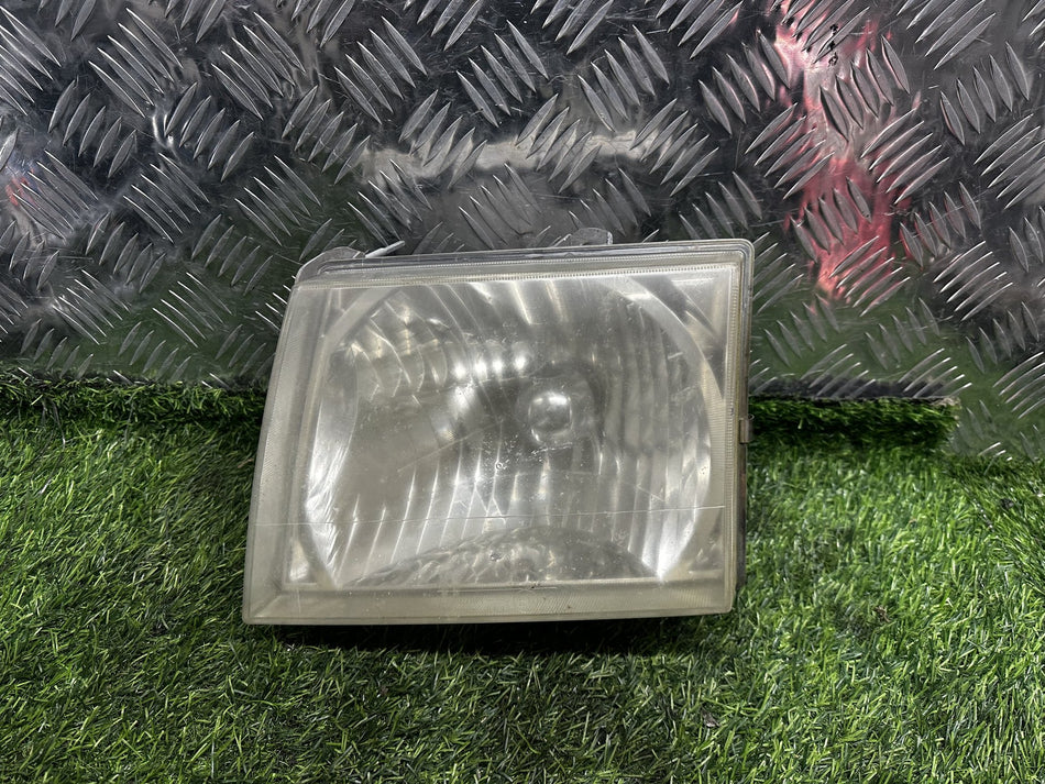 1999-2005 Ford Courier UN - Left Headlight PN: KOITO 100-16302