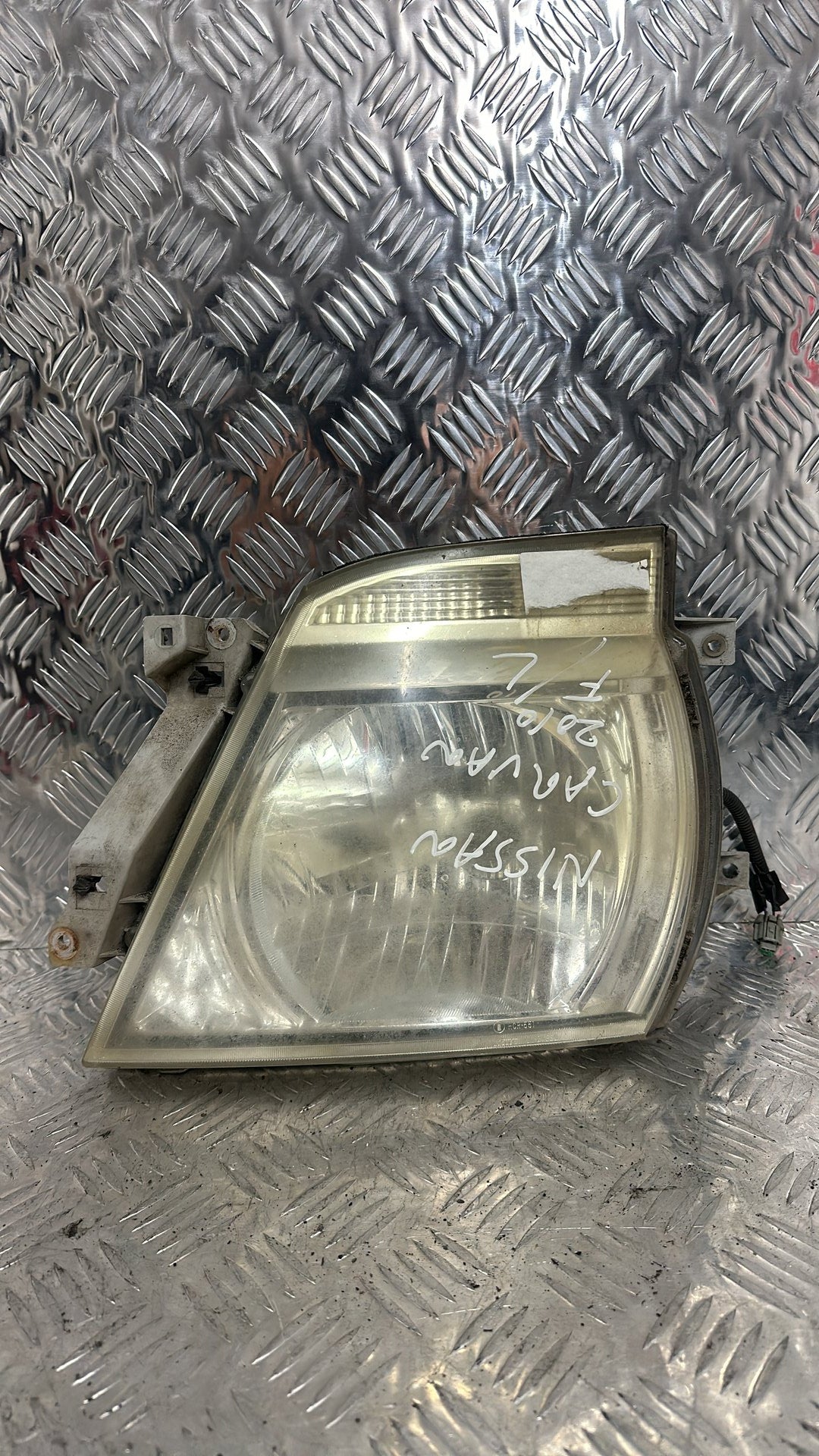 2007-2012 Nissan Caravan- Left Headlight PN: Koito 100-24880
