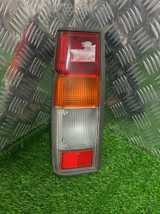 1997 - 2004 Nissan Navara Left Taillight KOITO 220-24671