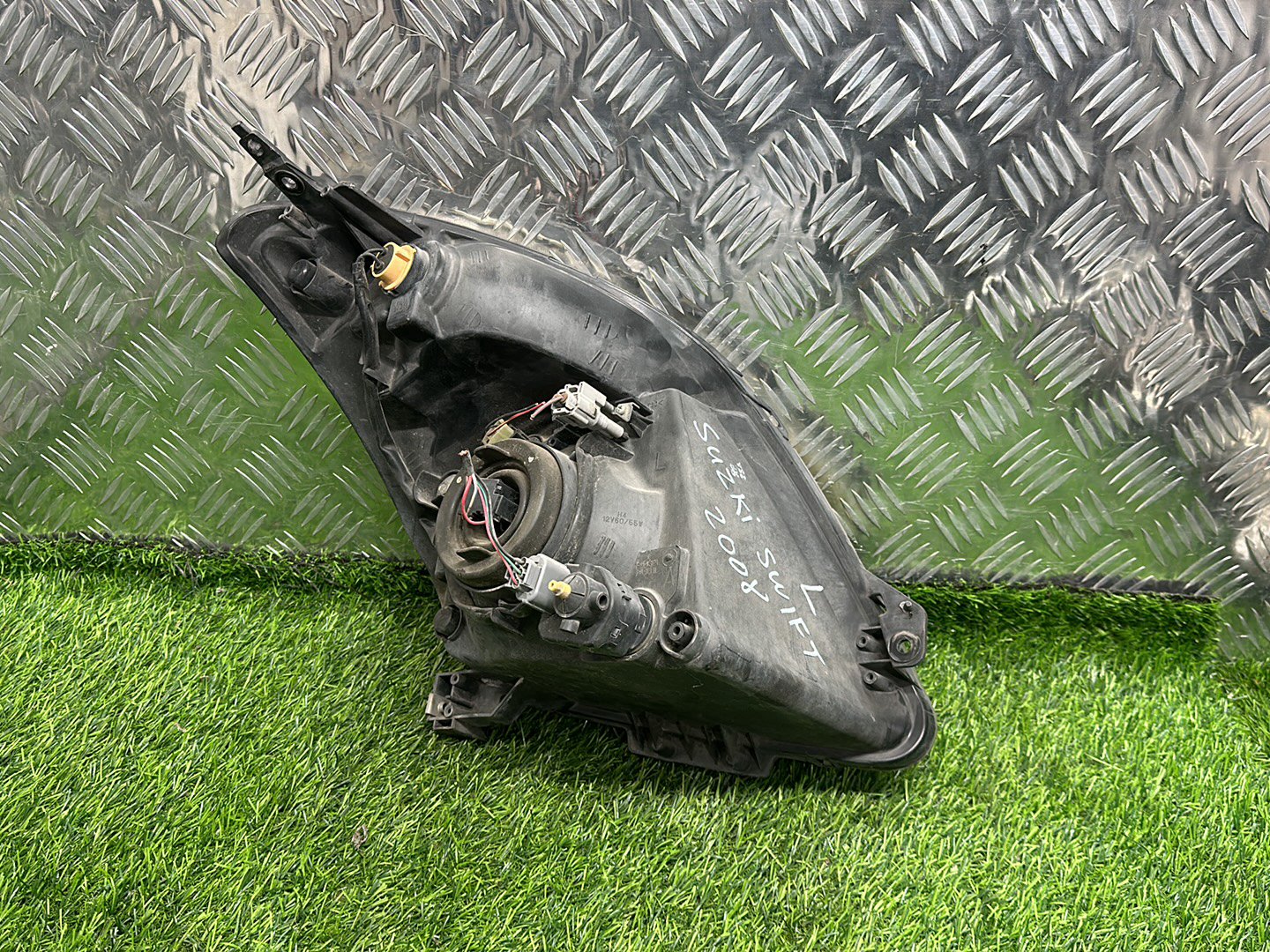 2004 - 2010 Suzuki Swift Left Headlight PN: P4432L