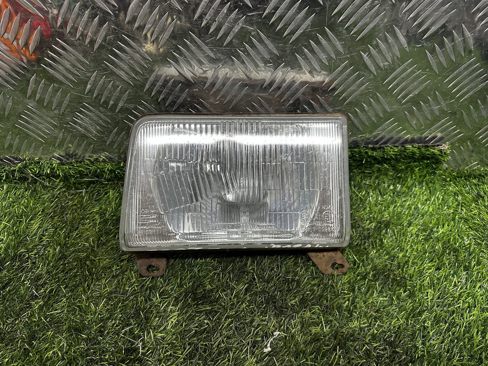 2003 Mazda E2000 - Left Headlight PN: STANLEY 001-3375