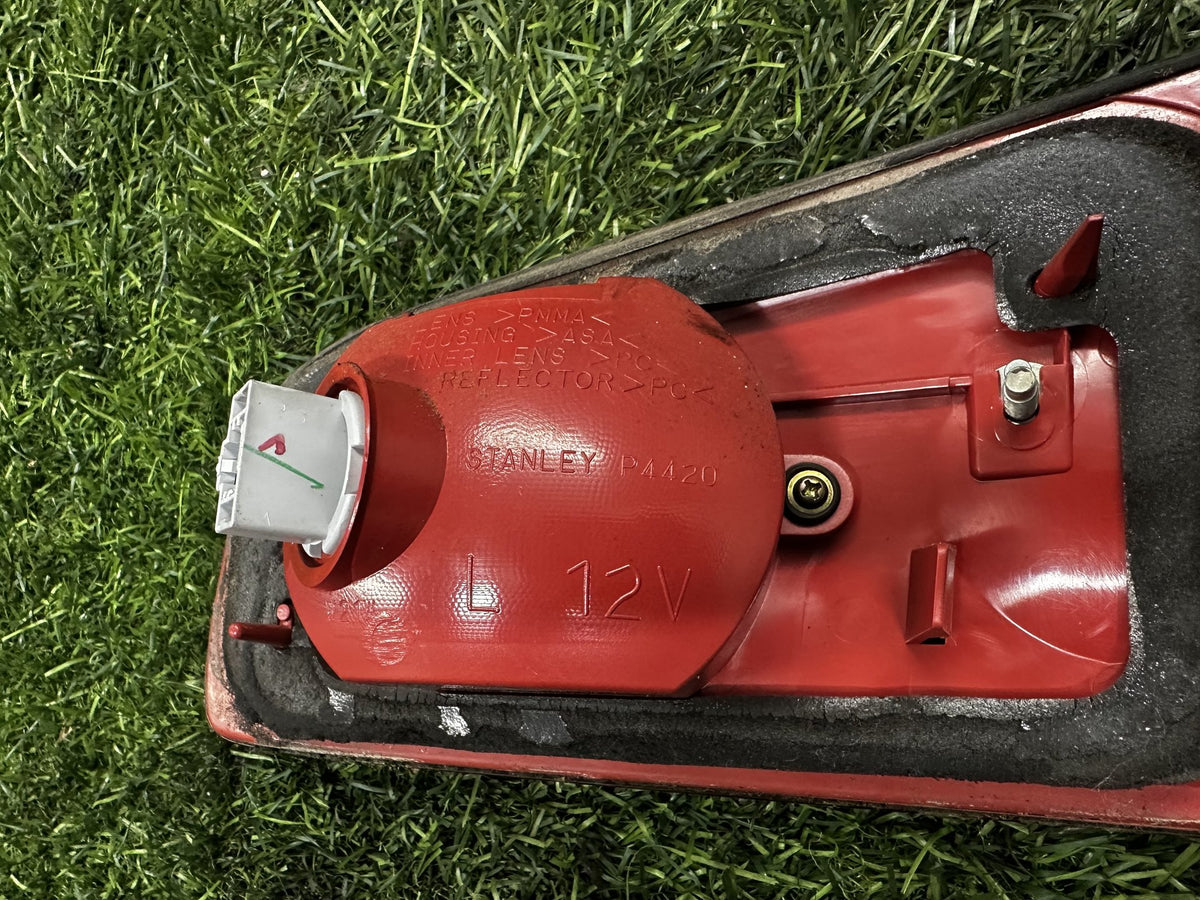 2002-2007 Mazda Demio DY - Left Tailgate Garnish PN: STANLEY P4420