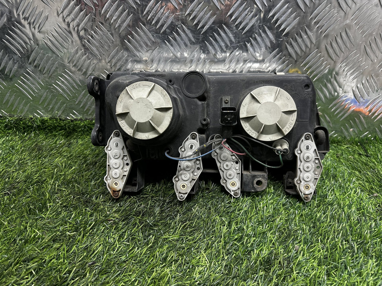2000-2006 Mitsubishi L300 - Left Headlight PN: KOITO 100-376194