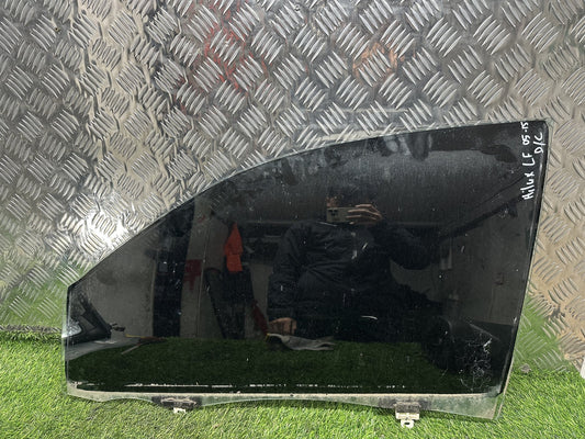 2005-2015 Toyota Hilux N20- Left Front Door Glass PN: TINTED