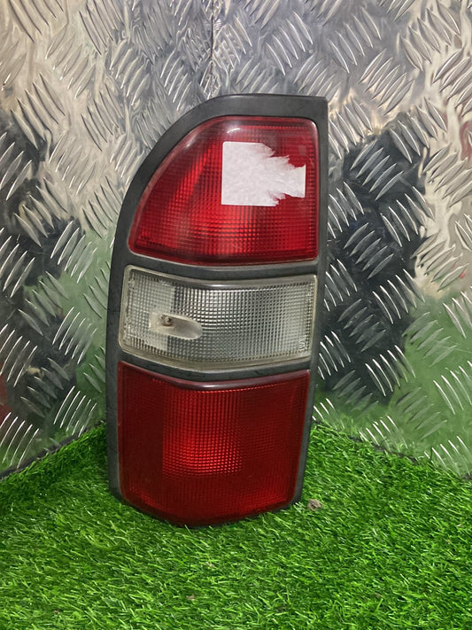 1996-2002 Toyota Land Cruiser J90- Left Taillight PN: KOITO 60-54