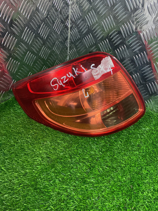2006-2013 Suzuki SX4 GY- Left Taillight PN: KOITO 220-16684