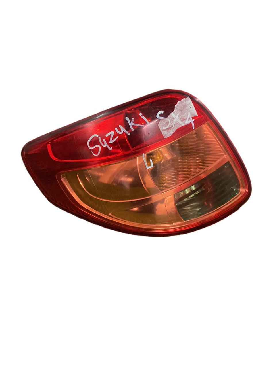 2006-2013 Suzuki SX4 GY- Left Taillight PN: KOITO 220-16684